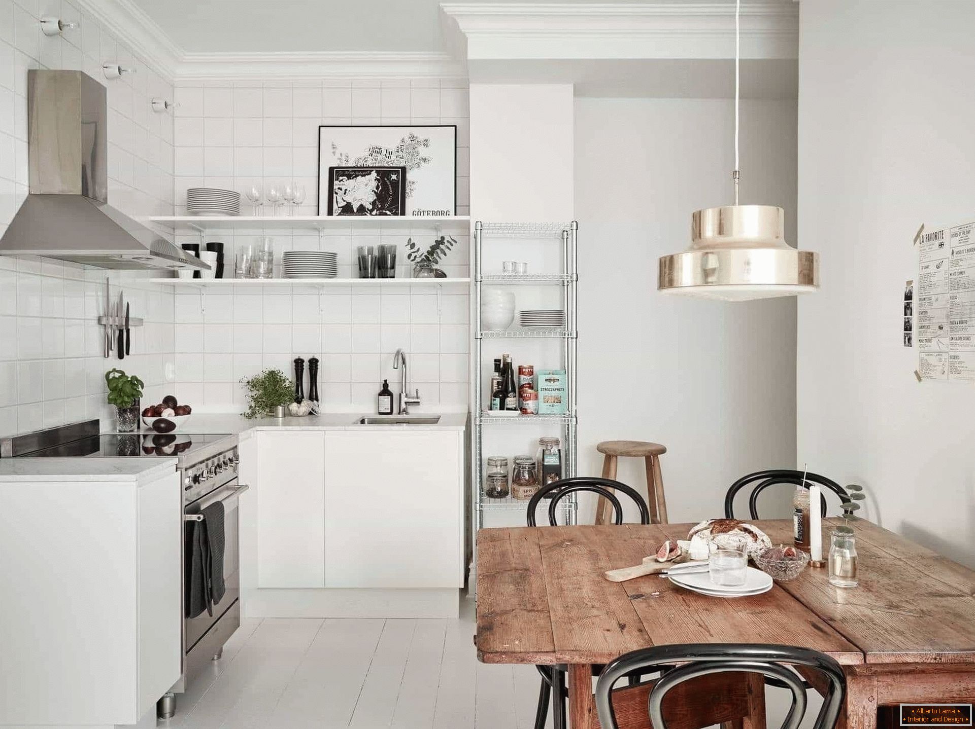White kitchen with a folding wooden table