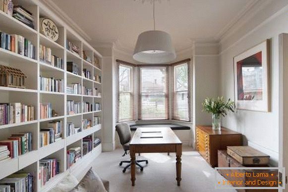 Cabinet with a library in the design of a private house