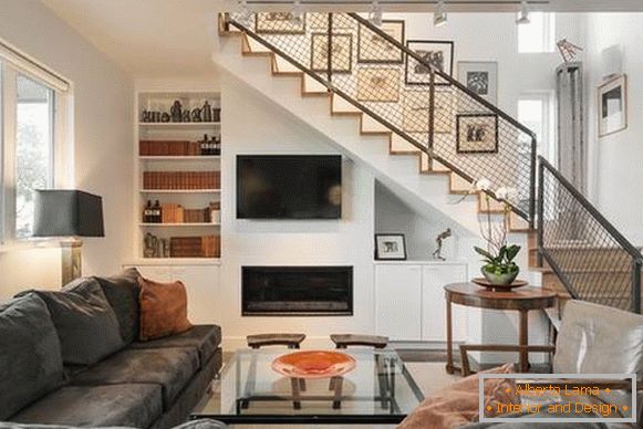 Photo of the living room and stairs in a private house