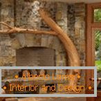 Wood as an element of decor for the fireplace