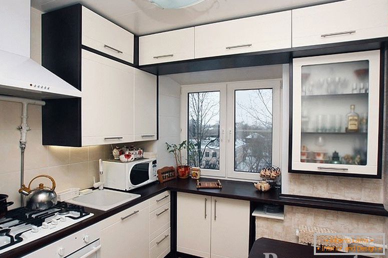 Kitchen with black and white furniture