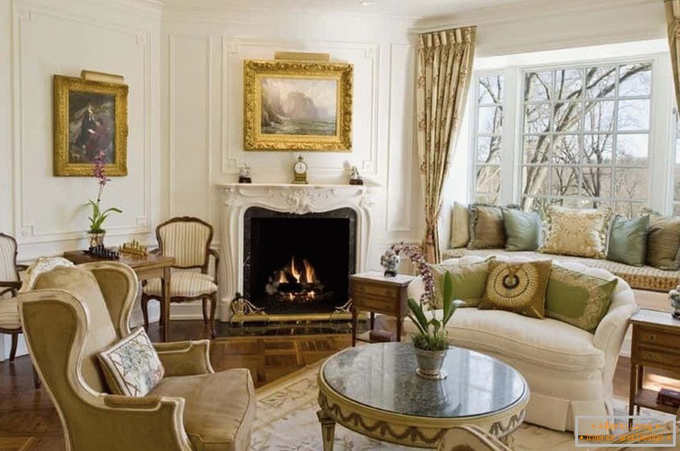 Living room with fireplace and bay window