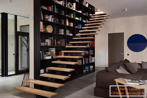 Modern living room design with a staircase in a private house