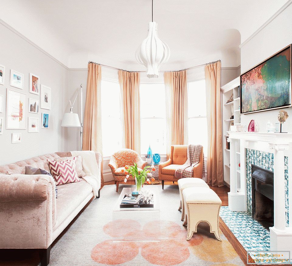 Antique armchairs in the living room with fireplace