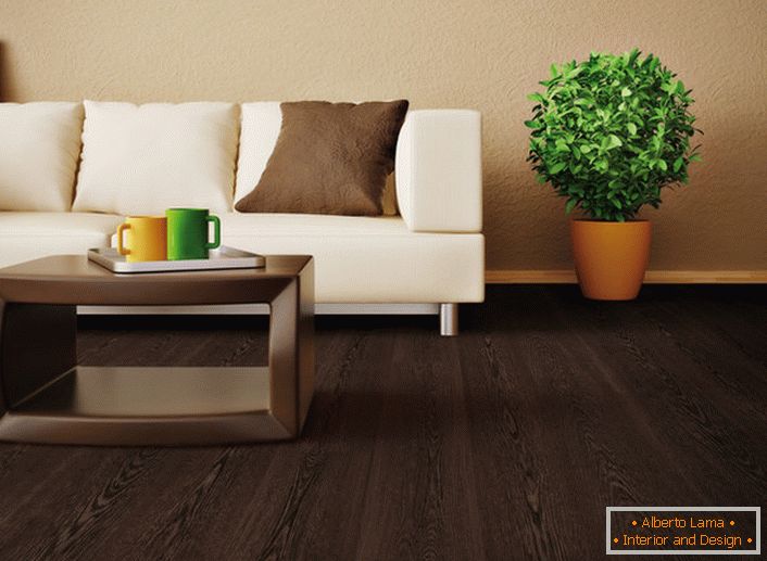 To decorate the living room, a wenge-colored laminate was used. Noble, luxurious shade of brown is favorably combined with the color of juicy greens.