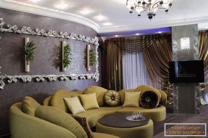 To decorate the living room in an art deco style, soft furniture of mustard color is chosen. Remarkable also stucco on the wall, which resembles an ornate, curly frame. 