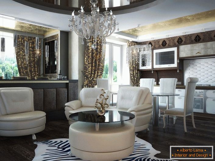 For a small living room in the studio apartment was chosen laconic, but noble furnishings. In accordance with the art deco style, a carpet with an animal print resembling a zebra skin is used for decor. 