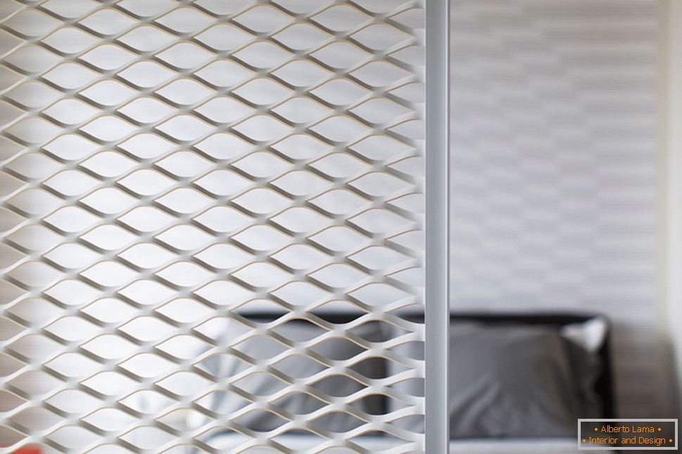 Openwork partition in the interior design of a small apartment