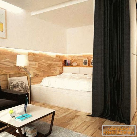 Interior design of a small apartment - separation of the bedroom with curtains