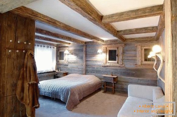 Interior of a bedroom in a country house in the style of a chalet