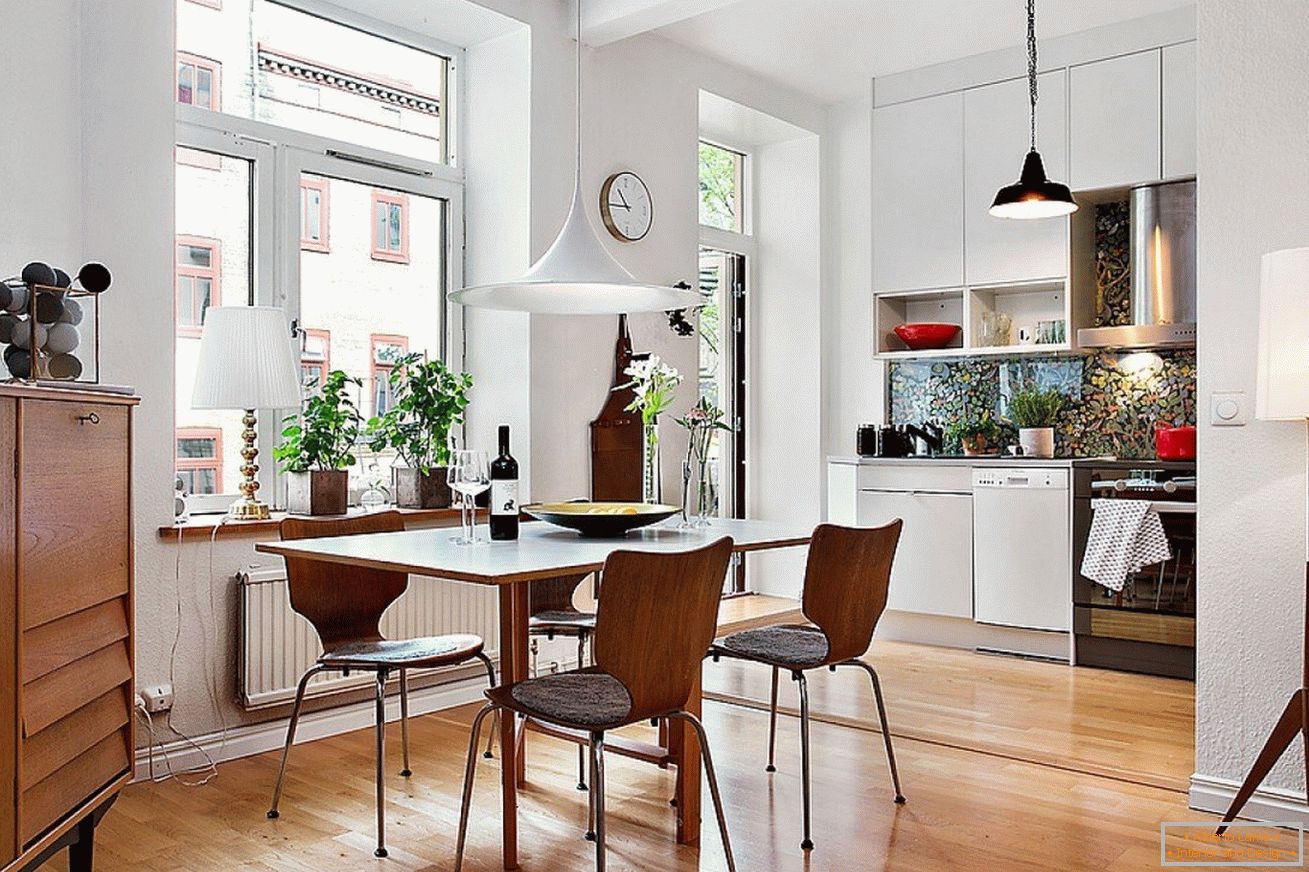 Scandinavian style in the interior of the kitchen-dining room