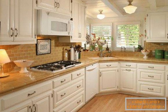 Kitchen design with sink near the window