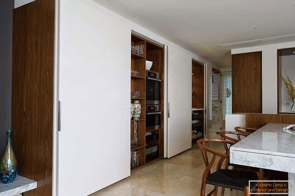 Kitchen utensils easily hide in the closet in the kitchen