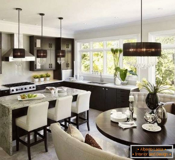 Kitchen design dining room living room in a private house in the style of luxury