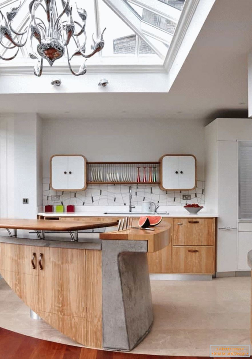 Kitchen in a country house with an unusual modern island