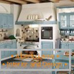 Kitchen with blue furniture