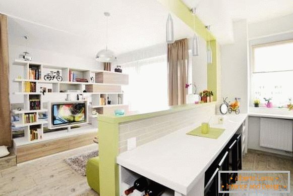 Kitchen in the design of a one-room apartment with a child