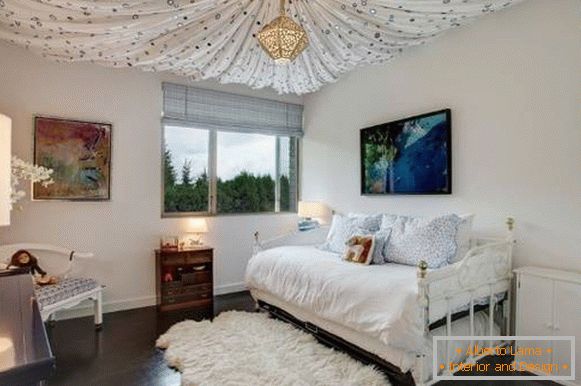 Beautiful ceiling with fabric in the bedroom