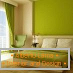 The combination of green and beige in the interior of the bedroom
