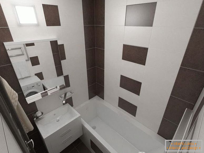 A small bathroom decorated with white and brown tiles