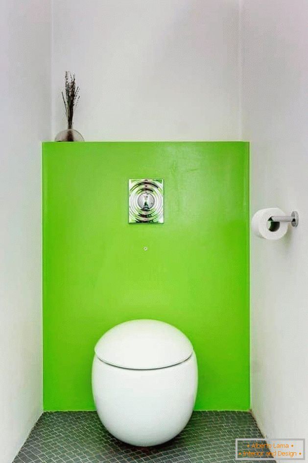 A small toilet in white with a toilet bowl of unusual shape