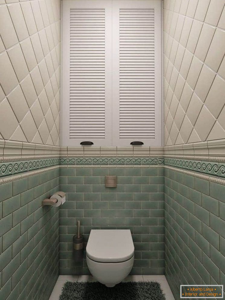 Small toilet in tile and with a niche
