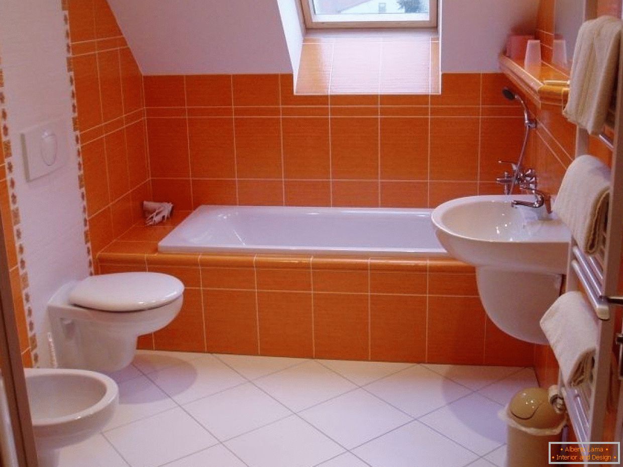 Orange bathroom with a small window