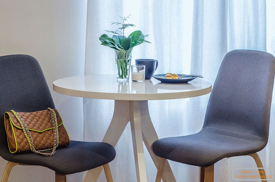 Dining table in the interior of the small living room