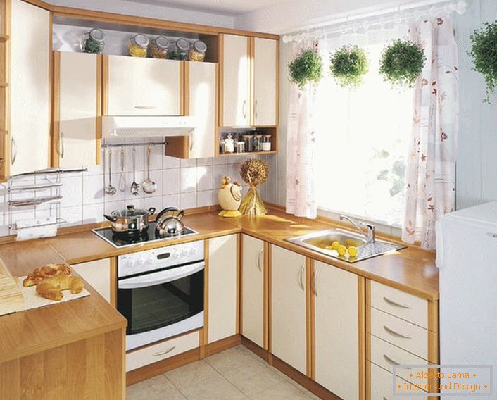 Modest kitchen on 12 squares of living space. To save space under the work surface, a window sill is used.