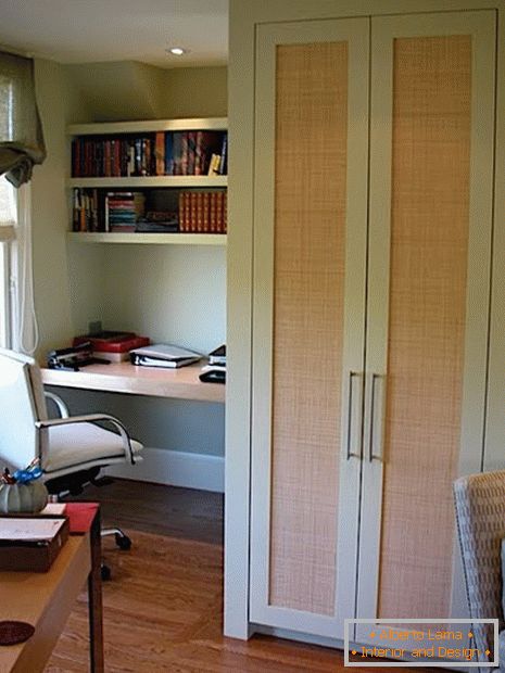 Book shelves above the workplace