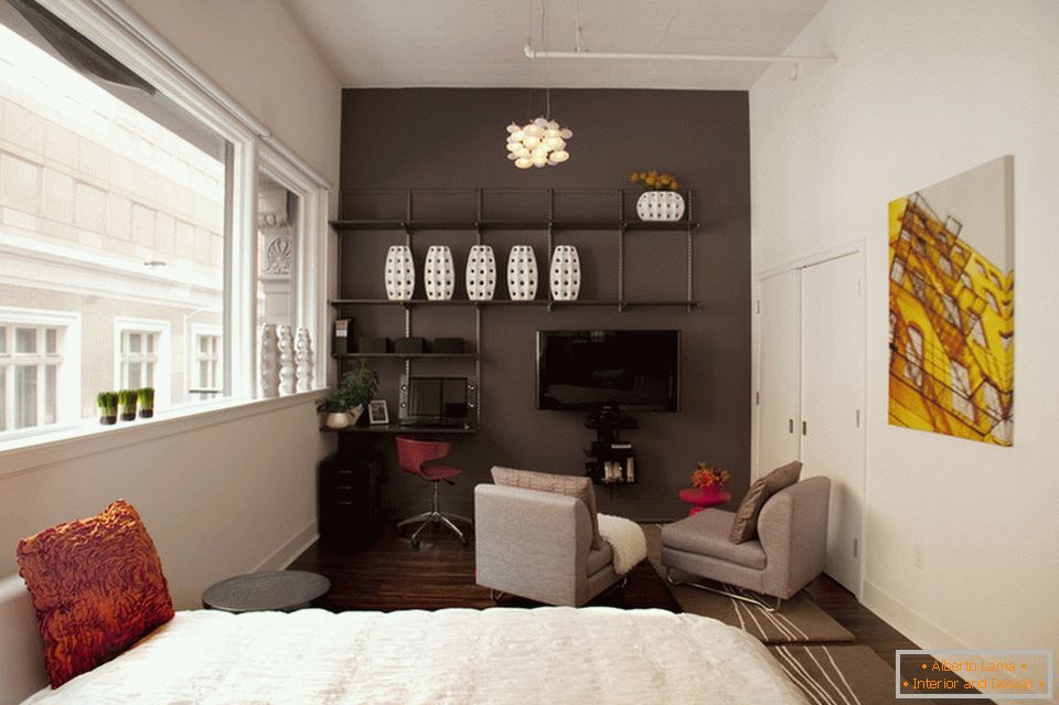 Dark accent wall in a bright room
