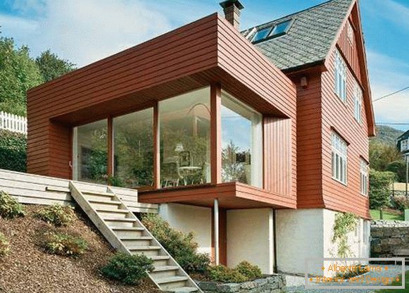 Beautiful wooden houses in high-tech style