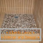 Mosaic on the floor in the shower