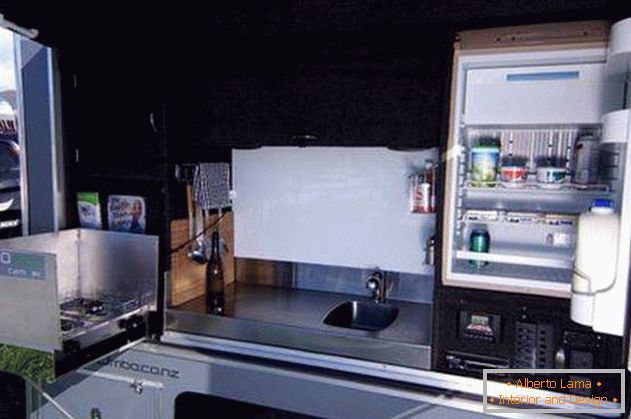 Mini-house on wheels: kitchen with refrigerator