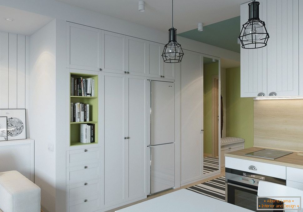 White cabinets in the interior of a small apartment