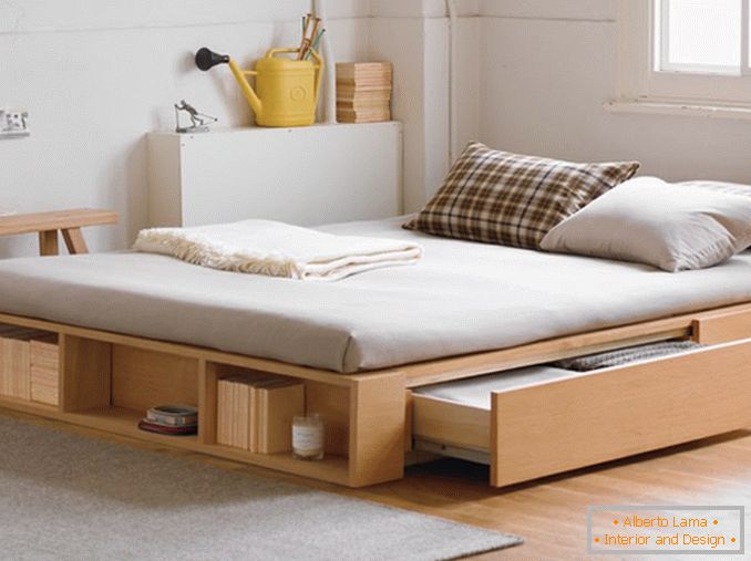 Bed with drawers in the bedroom
