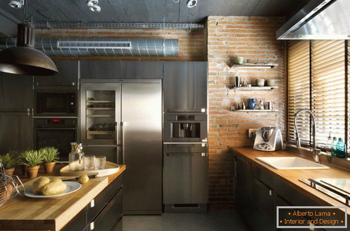 Kitchen space in loft style. The correct example of a functional organization - the window sill is involved in the work area.