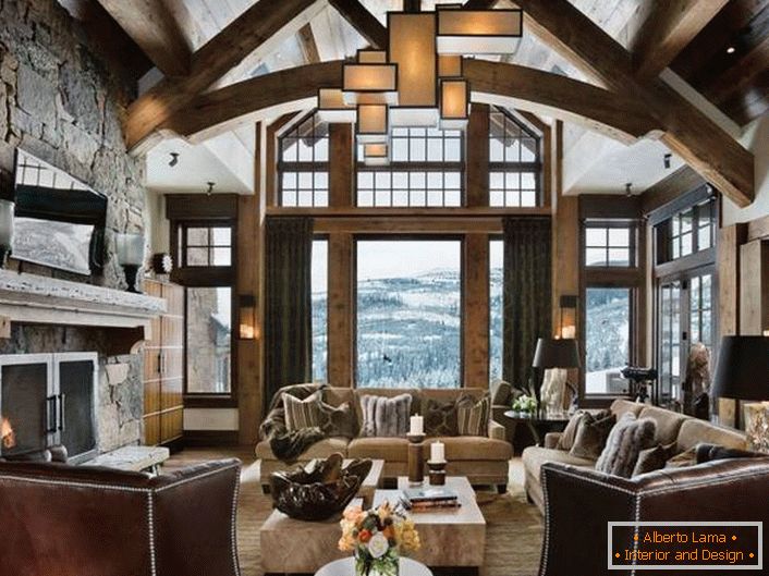 Mansard in a hunting lodge in the style of a chalet. Luxurious structure with a thematic interior is an excellent option for suburban real estate.