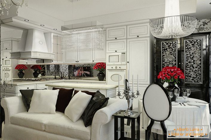 Kitchen-living room in the style of art deco with white suite and built-in appliances.