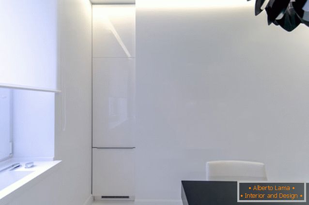 Modern refrigerator in the interior of the kitchen