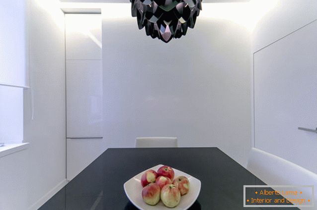 Chic chandelier above the dining table