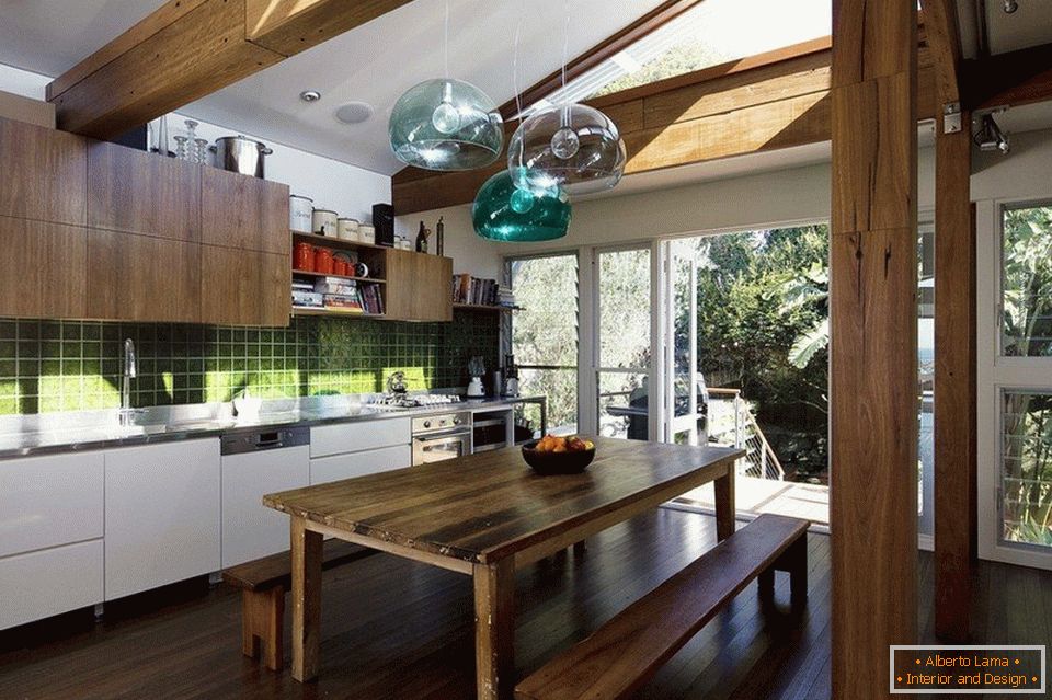 Wooden beams and furniture in eco style kitchen