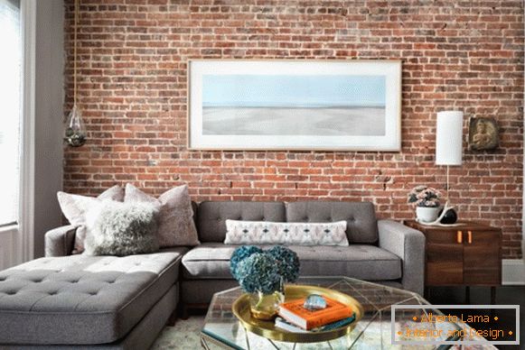 Apartment design photo of the hall 18 sq. M with a brick wall