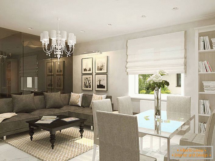Living room in a modern style is competently divided into a recreation area and a dining area with the help of a design game with a color scheme.