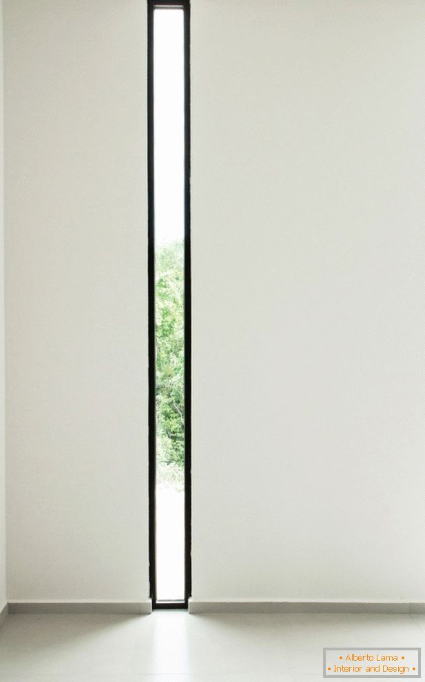 An unusual long but narrow window from floor to ceiling