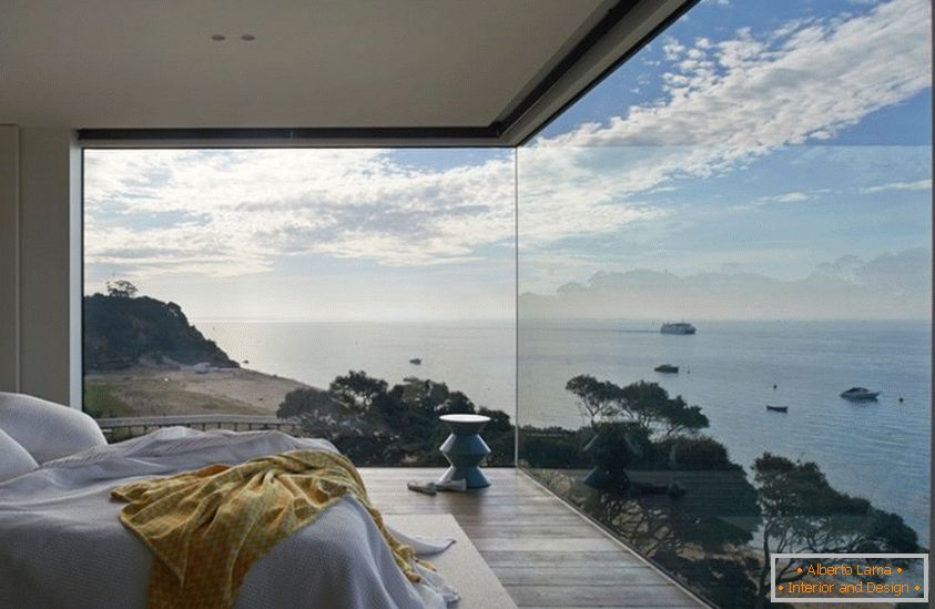 Panoramic windows in the bedroom