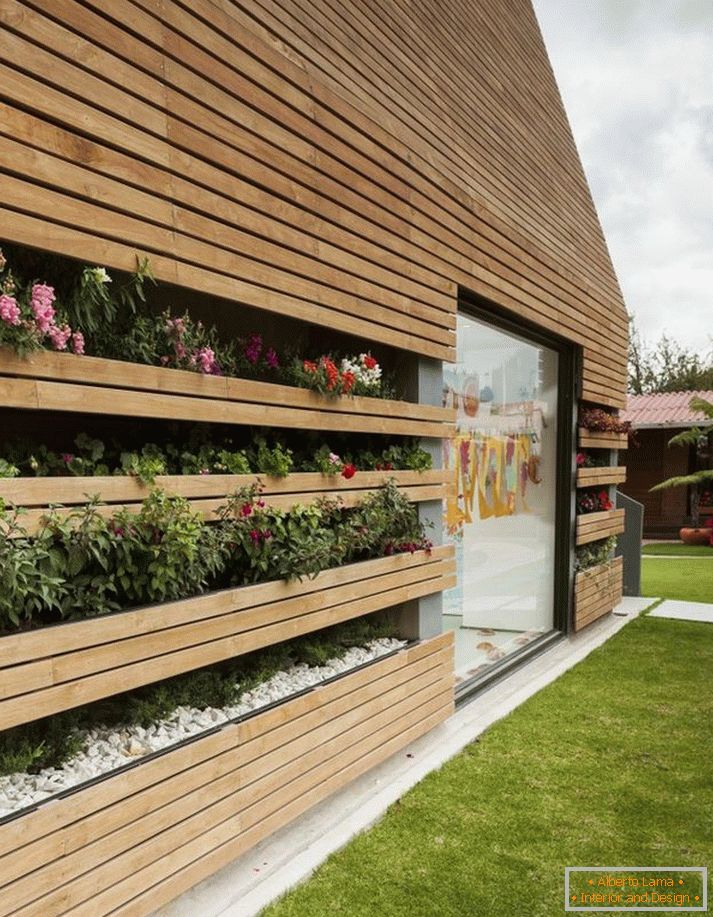 Unusual wooden facade with flowers