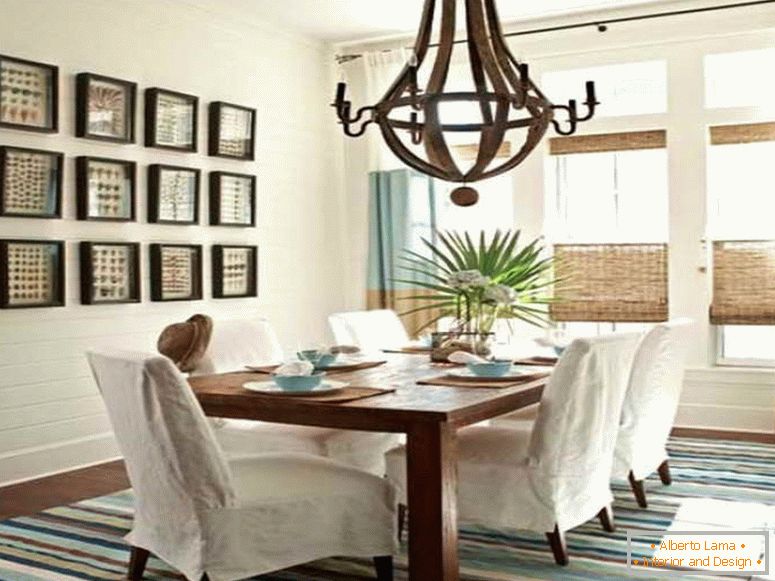 Monochrome covers on chairs in the dining room