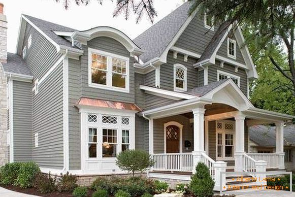 Facade stucco from polyurethane on the gray house