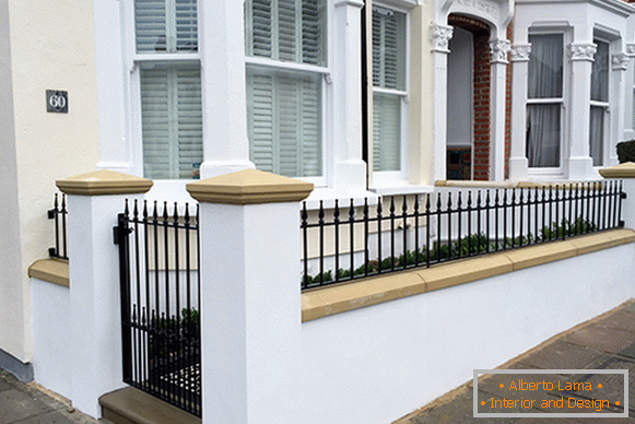 Facade stucco from polyurethane on a white facade